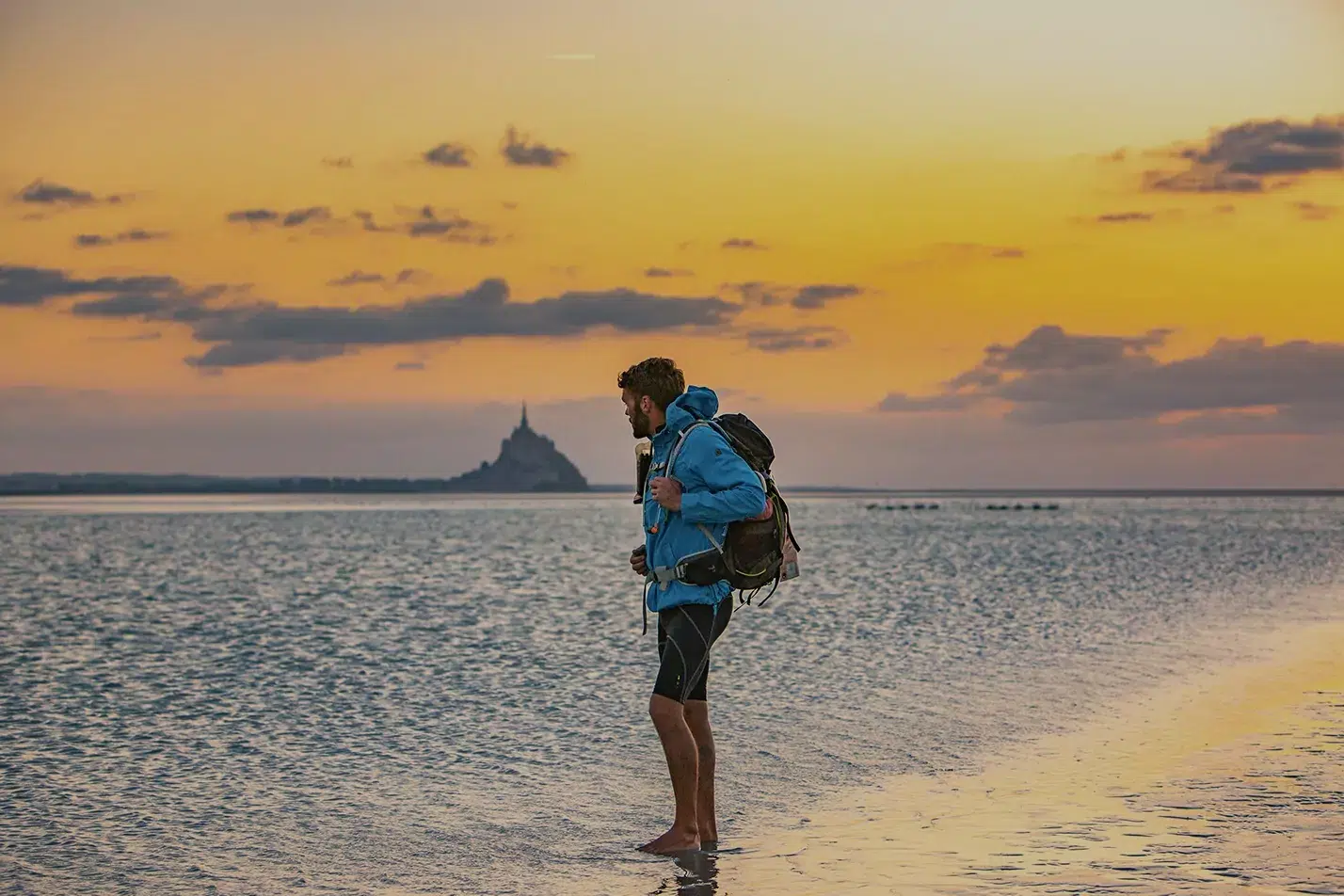 Travesía guiada por el guía Ludo hacia el Mont-Saint-Michel