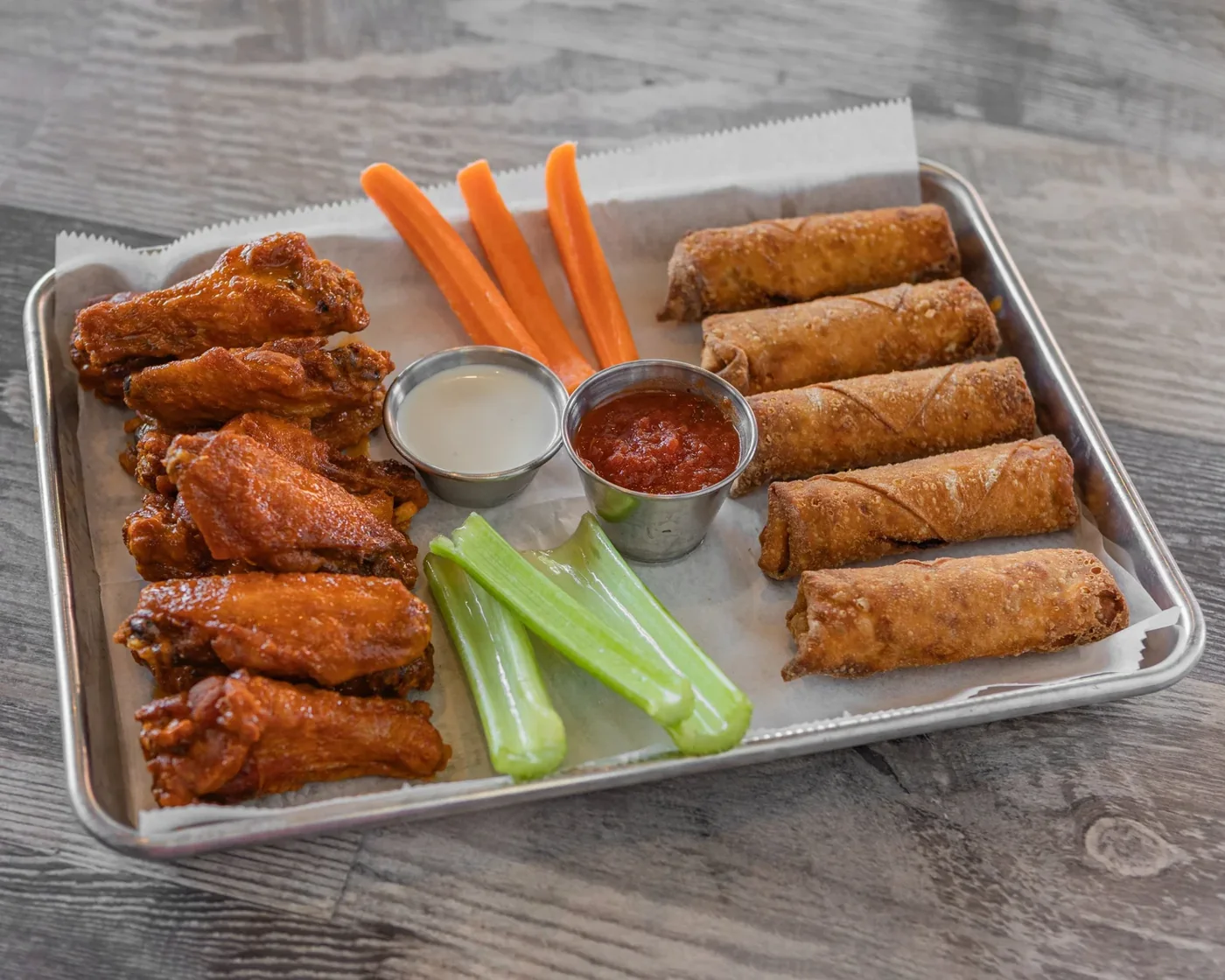 Wings and sides at Taps on Main in Kansas City. Source: https://www.tapsonmain.com/