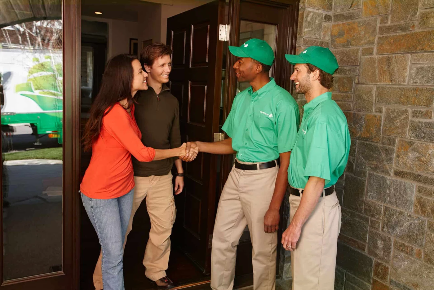 Arrow Moving movers helping a family, official company photo.
