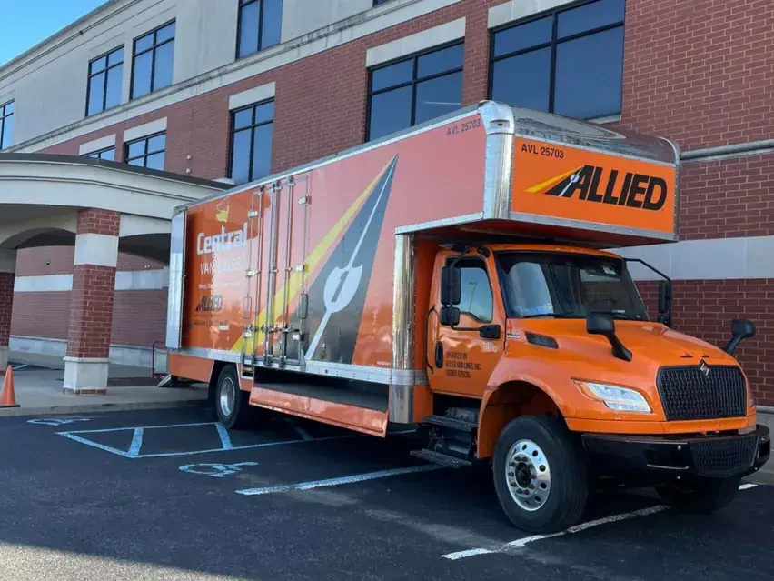 Central Van Lines moving truck outside a commercial building.