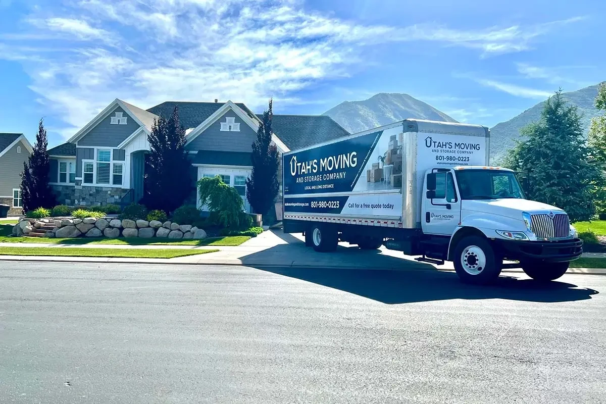 Utah’s Moving & Storage truck at a residence, image from its official website.