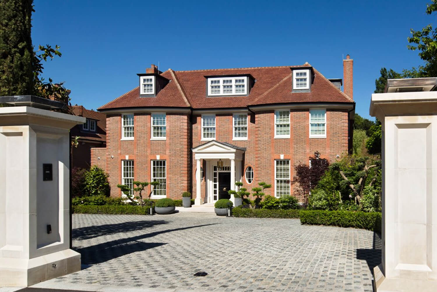 House exterior shown in Stokemont’s property-survey image set