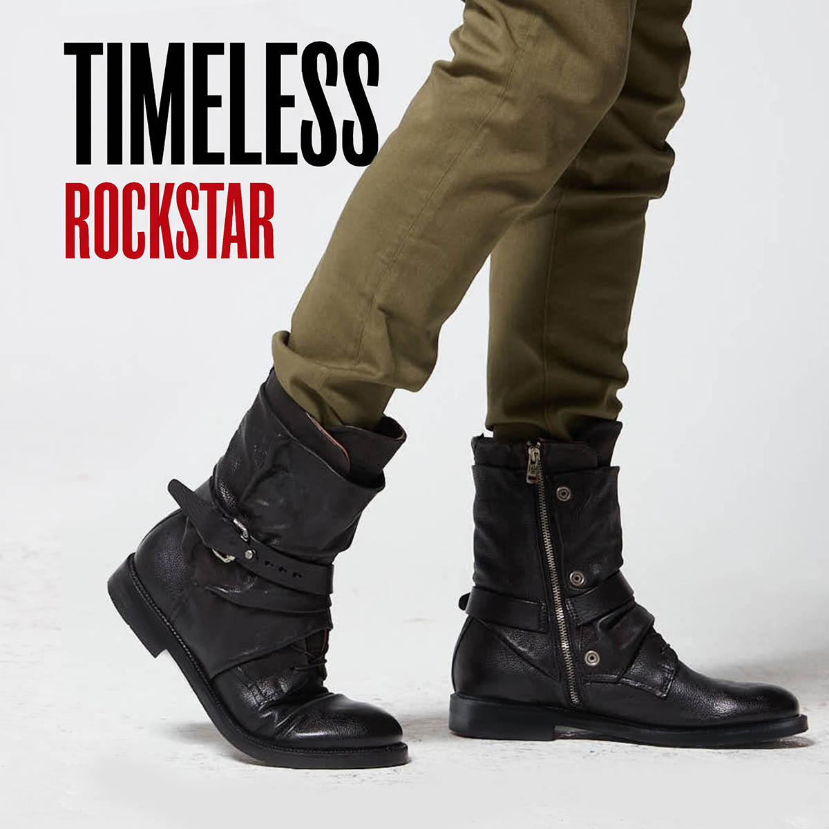 Black A.S.98 ankle boots with metal hardware, shown on a model.