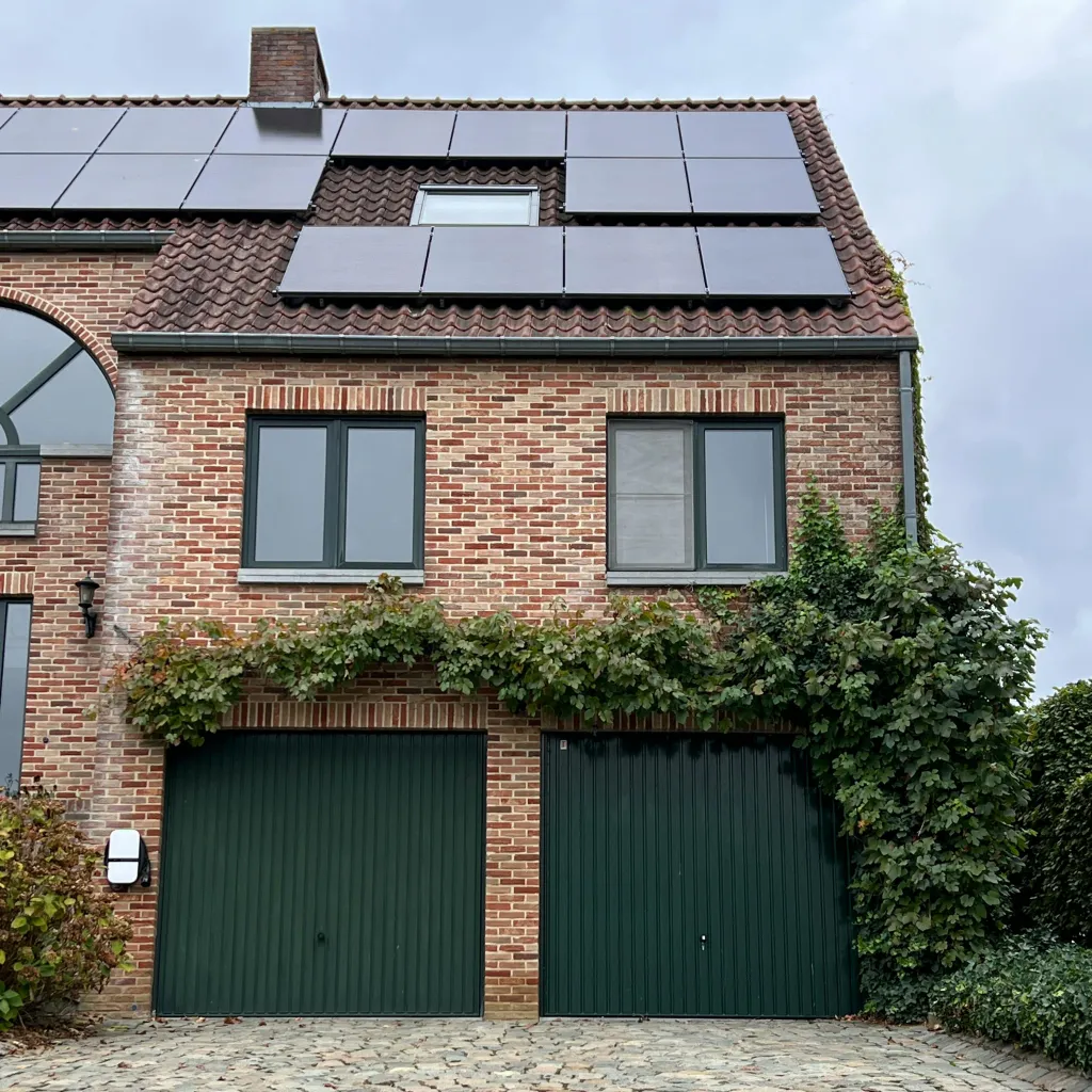 Solar panels installed on the roof of a home by Home Comfort Enterprises