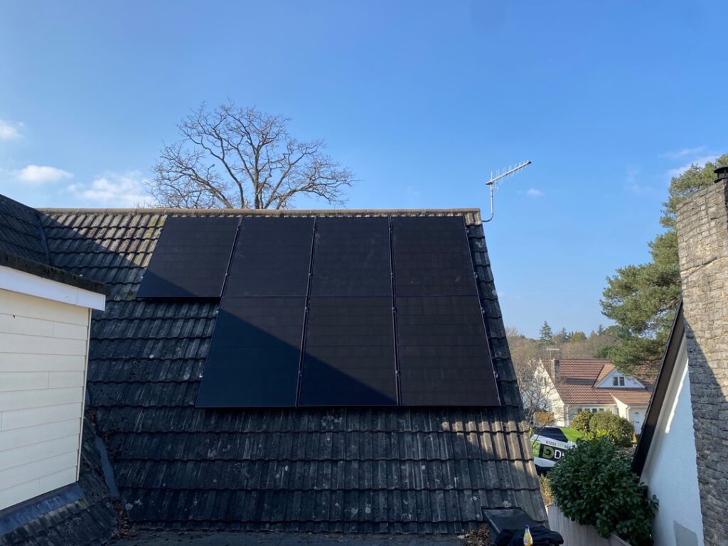 Solar panels installed on the roof of a house.