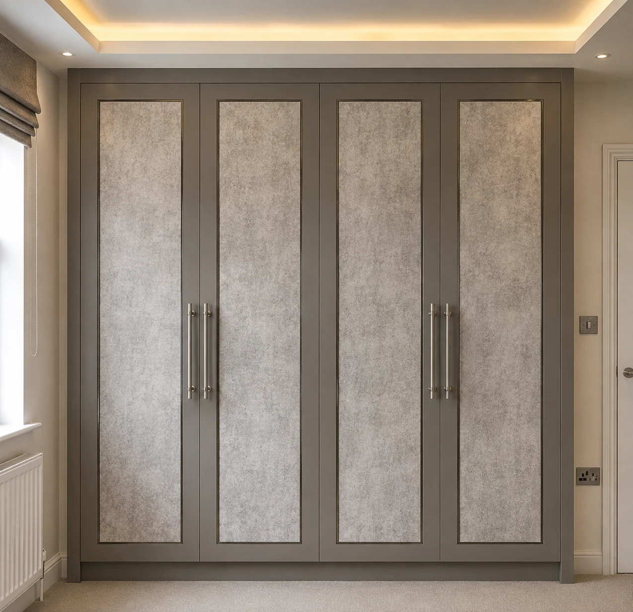 A fitted bedroom wardrobe with paneled doors.