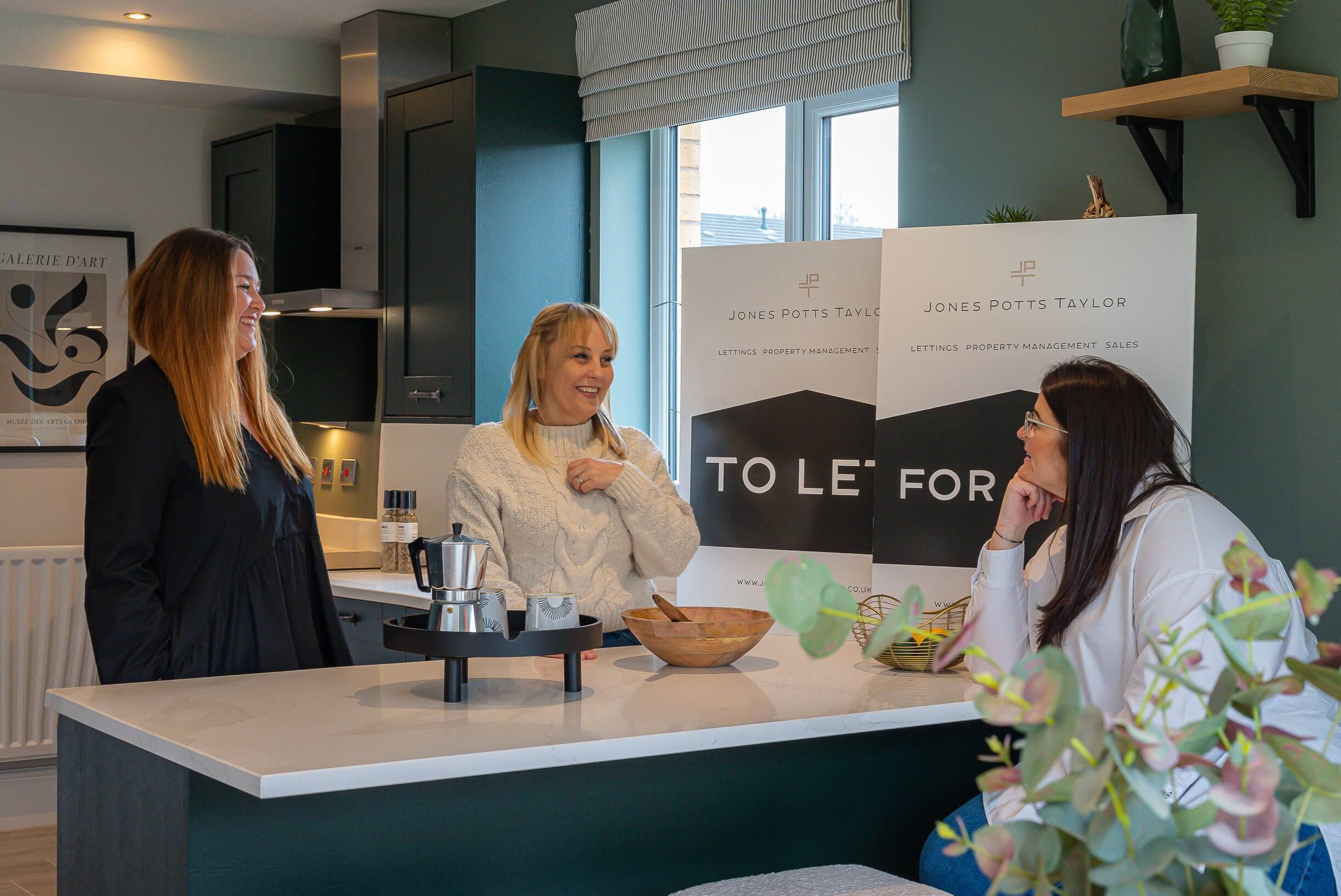 Jones Potts Taylor staff meeting clients in the Leigh office