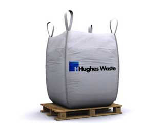 Hughes Waste branded grab bag on a wooden pallet