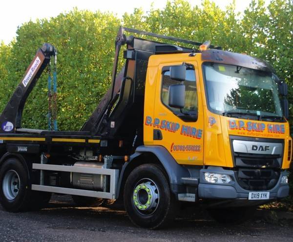 DP Skip Hire truck carrying a skip container