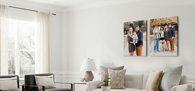 Family photographs printed on canvas and displayed in a living room