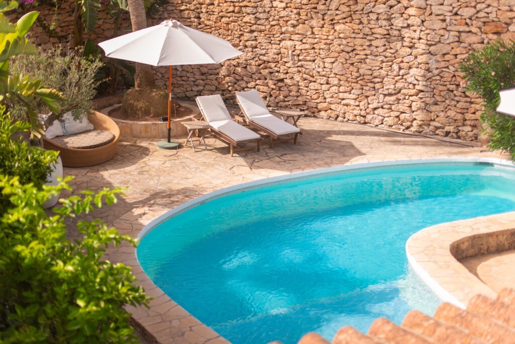 Pool and terrace at a Domundos villa in Ibiza