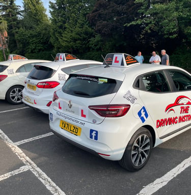 Driving school cars parked together