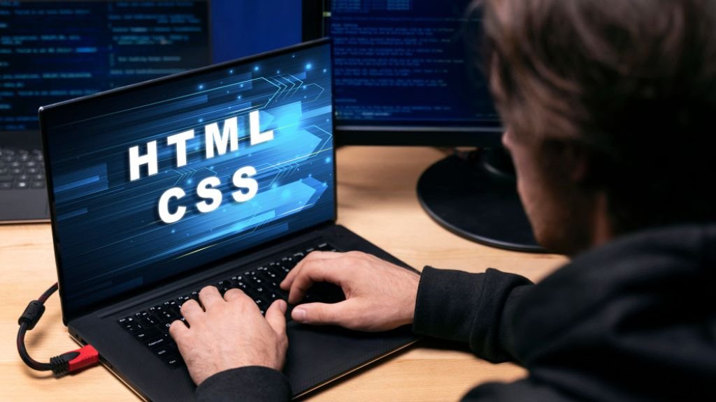 Person coding at a computer