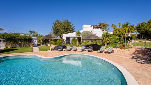 Holiday villa and outdoor pool featured by The Villa Agency