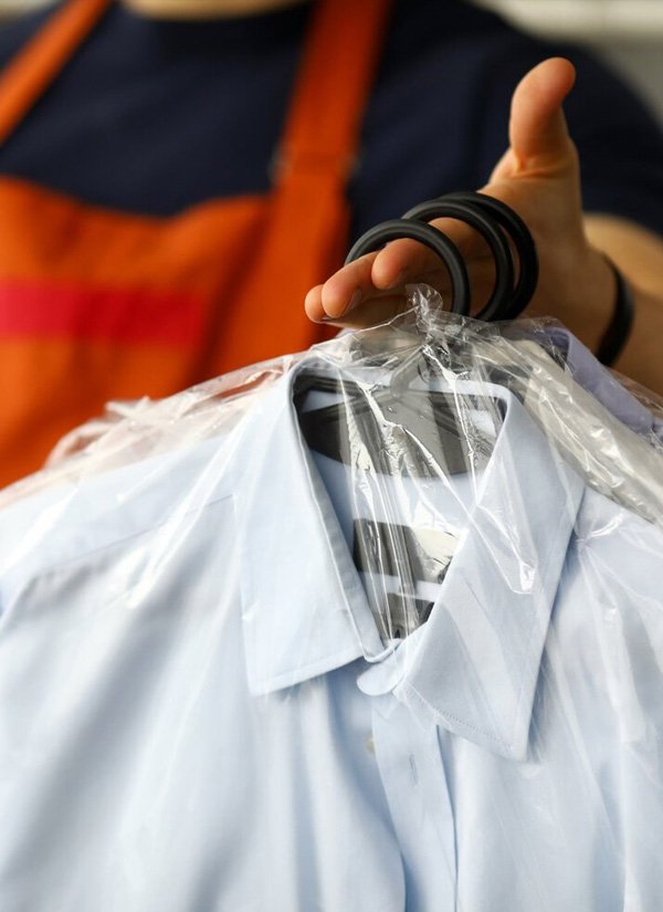 Clean shirt on a hanger from Revivo laundry service