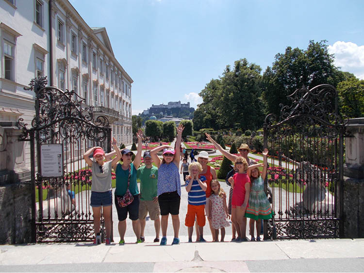 Bicycle tour participants at a historic Salzburg location