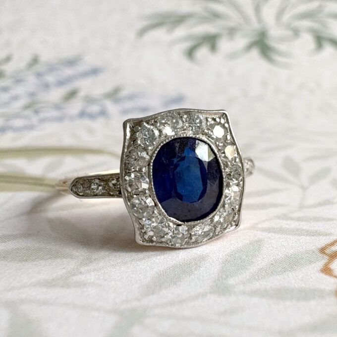 Vintage sapphire and diamond ring displayed by Secret Histories