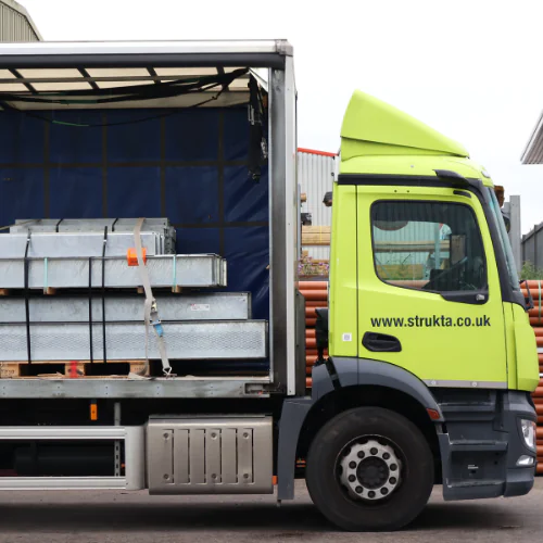 strukta delivery truck carrying construction materials