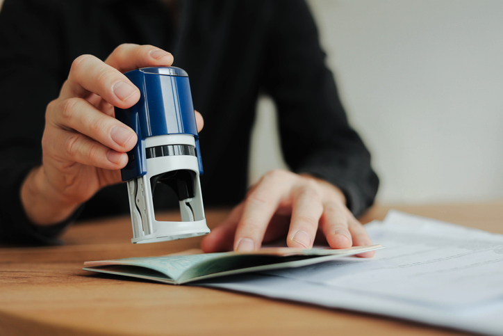 Business advisors reviewing documents with a client