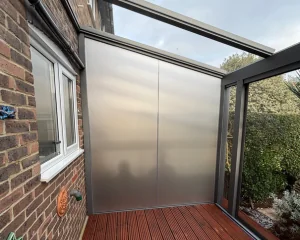 Privacy film fitted to a glazed structure